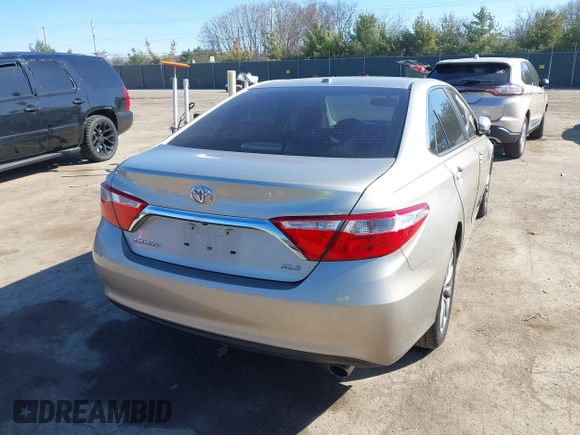 2015 Toyota Camry XLE with VIN 4T1BF1FK6FU942850, listed as a IAAI auction lot 41878424 with 95,232 mi miles and . Bid and sale history available at DreamBid. Image 4.