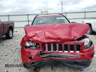 2016 Jeep Compass Sport SE with VIN 1C4NJDBB0GD759999, listed as a Copart auction lot 56983255 with 69,548 mi miles and Salvage title. Bid and sale history available at DreamBid. Image 14.