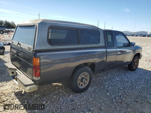 1995 Nissan Frontier XE z VIN 1N6HD16S6SC450675, wystawiony jako Copart lot #88047365 z przebiegiem 193 820 mil mil oraz Czysty tytuł • Clean title. Historia ofert i sprzedaży dostępna na DreamBid. Obrazek 3.