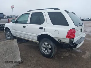 2001 Isuzu Rodeo S with VIN 4S2DM58WX14315138, listed as a IAAI auction lot 41535619 with 217,960 mi miles and . Bid and sale history available at DreamBid. Image 3.