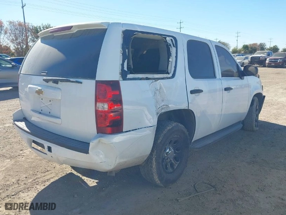 2012 Chevrolet Tahoe Commercial with VIN 1GNLC2E01CR245275, listed as a IAAI auction lot 41069908 with 188,179 mi miles. Bid and sale history available at carsss.com. Image 4.