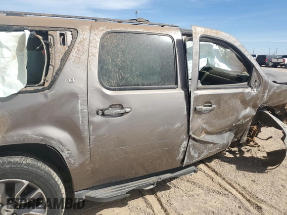 2014 Chevrolet Suburban LT with VIN 1GNSCJE01ER226363, listed as a Copart auction lot 50534915 with 185,731 mi miles and Salvage Title. Bid and sale history available at carsss.com. Image 12.