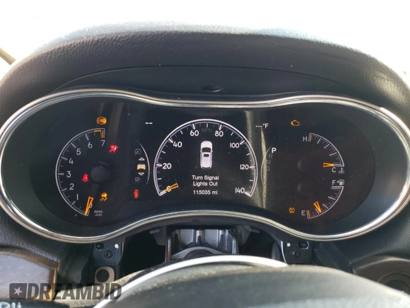 2017 Jeep Grand Cherokee Laredo with VIN 1C4RJEAG4HC952605, listed as a Copart auction lot 56693145 with 115,035 mi miles and Salvage title. Bid and sale history available at DreamBid. Image 9.