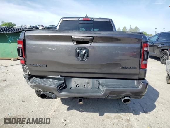 2021 Ram 1500 Laramie with VIN 1C6SRFJT3MN677537, listed as a Copart auction lot 57936295 with Not provided miles and Salvage title. Bid and sale history available at DreamBid. Image 6.