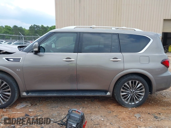 2019 Infiniti QX80 Luxe z VIN JN8AZ2NF2K9681574, wystawiony jako IAAI lot #41987298 z przebiegiem 123 931 mil mil oraz . Historia ofert i sprzedaży dostępna na DreamBid. Obrazek 13.