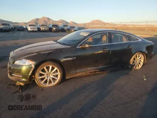 2013 Jaguar XJ with VIN SAJWA1C70D8V50877, listed as a Copart auction lot 88542785 with 76,394 mi miles and Salvage Title. Bid and sale history available at DreamBid. Image 1.