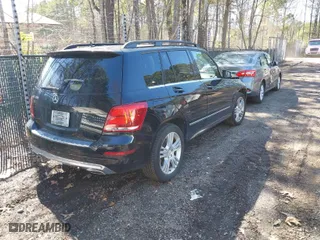 2014 Mercedes-Benz GLK-Class GLK 350 with VIN WDCGG5HB7EG232939, listed as a IAAI auction lot 41898550 with 128,356 mi miles. Bid and sale history available at carsss.com. Image 4.