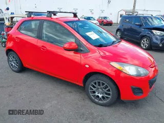 2013 Mazda 2 Sport z VIN JM1DE1KZ6D0167599, wystawiony jako IAAI lot #42143343 z przebiegiem 145 688 mil mil oraz . Historia ofert i sprzedaży dostępna na DreamBid. Obrazek 1.