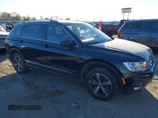 2018 Volkswagen Tiguan SEL with VIN 3VV3B7AX7JM117053, listed as a IAAI auction lot 40827695 with 71,489 mi miles and . Bid and sale history available at DreamBid. Image 13.