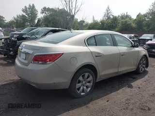 2012 Buick LaCrosse Premium 1 z VIN 1G4GD5E32CF113903, wystawiony jako IAAI lot #42454096 z przebiegiem 133 803 mil mil oraz . Historia ofert i sprzedaży dostępna na DreamBid. Obrazek 4.