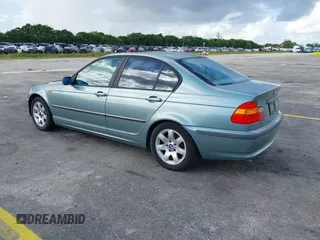 2005 BMW 3 Series 325i with VIN WBAEV33415KW16936, listed as a IAAI auction lot 41094134 with 208,794 mi miles. Bid and sale history available at carsss.com. Image 3.