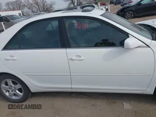 2003 Toyota Camry LE with VIN 4T1BE32K13U250477, listed as a IAAI auction lot 41996101 with 212,951 mi miles and . Bid and sale history available at DreamBid. Image 13.