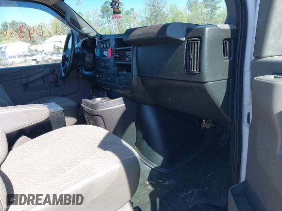 2021 Chevrolet Express Cargo Van with VIN 1GCWGAFP0M1206242, listed as a IAAI auction lot 42043866 with 148,087 mi miles. Bid and sale history available at carsss.com. Image 5.