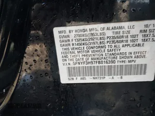 2015 Honda Pilot Touring with VIN 5FNYF3H97FB016390, listed as a IAAI auction lot 41753590 with 217,156 mi miles. Bid and sale history available at carsss.com. Image 9.