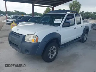 2001 Nissan Frontier SE z VIN 1N6ED27T61C300323, wystawiony jako IAAI lot #42401852 z przebiegiem 317 648 mil mil oraz . Historia ofert i sprzedaży dostępna na DreamBid. Obrazek 2.