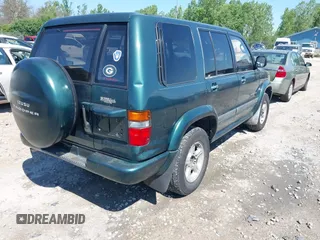 1999 Isuzu Trooper S with VIN JACDJ58X1X7917154, listed as a IAAI auction lot 42632311 with 200,023 mi miles and . Bid and sale history available at DreamBid. Image 4.