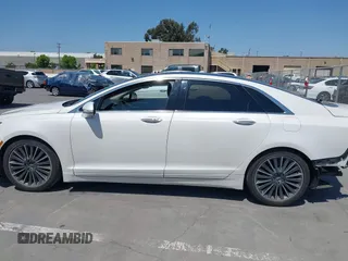 2015 Lincoln MKZ Hybrid with VIN 3LN6L2LU6FR614177, listed as a IAAI auction lot 42442715 with 171,460 mi miles and . Bid and sale history available at DreamBid. Image 15.