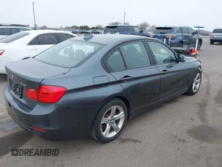 2015 BMW 3 Series 328i xDrive with VIN WBA3B3G53FNR88717, listed as a IAAI auction lot 41941261 with 107,947 mi miles and . Bid and sale history available at DreamBid. Image 4.