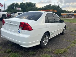 2004 Honda Civic z VIN 1HGEN26474L000211, wystawiony jako Copart lot #60339255 z przebiegiem 114 272 mil mil oraz Czysty tytuł • Clean title. Historia ofert i sprzedaży dostępna na DreamBid. Obrazek 4.