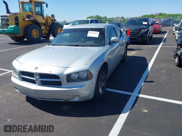 2010 Dodge Charger SXT with VIN 2B3CA3CV4AH253226, listed as a IAAI auction lot 42031664 with 173,785 mi miles. Bid and sale history available at carsss.com. Image 2.