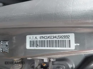 2004 Hyundai Accent GL z VIN KMHCG45C04U502892, wystawiony jako IAAI lot #42309078 z przebiegiem 127 362 mil mil oraz . Historia ofert i sprzedaży dostępna na DreamBid. Obrazek 9.