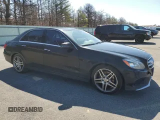 2016 Mercedes-Benz E-Class E 400 with VIN WDDHF6HB9GB201670, listed as a Copart auction lot 51097075 with 151,972 mi miles and Salvage Title. Bid and sale history available at carsss.com. Image 4.