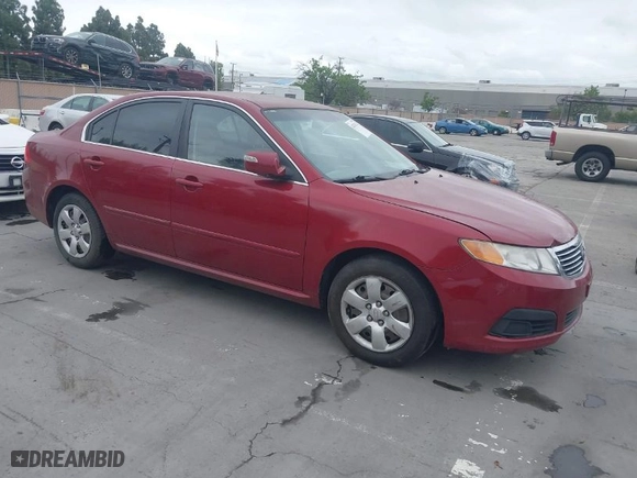 2009 Kia Optima LX with VIN KNAGE228095312766, listed as a IAAI auction lot 42074522 with 183,240 mi miles. Bid and sale history available at carsss.com. Image 1.