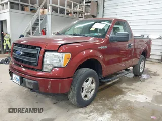 2014 Ford F-150 XL with VIN 1FTMF1EM4EKD79307, listed as a IAAI auction lot 42137527 with 57,963 mi miles. Bid and sale history available at carsss.com. Image 2.