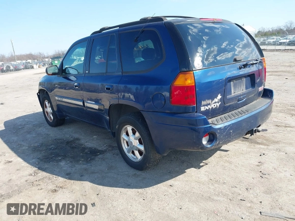 2003 GMC Envoy SLE with VIN 1GKDT13S432364768, listed as a IAAI auction lot 41467418 with 220,170 mi miles. Bid and sale history available at carsss.com. Image 3.