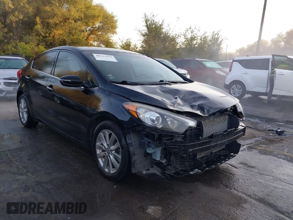 2014 Kia Forte EX with VIN KNAFX4A8XE5121630, listed as a IAAI auction lot 40517819 with 144,087 mi miles. Bid and sale history available at carsss.com. Image 1.