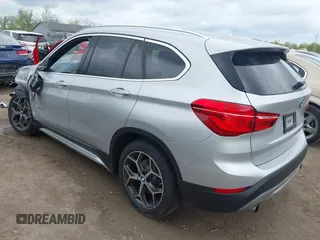 2017 BMW X1 xDrive28i z VIN WBXHT3Z38H4A58246, wystawiony jako IAAI lot #42160921 z przebiegiem 106 795 mil mil oraz . Historia ofert i sprzedaży dostępna na DreamBid. Obrazek 3.