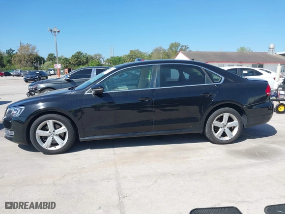 2012 Volkswagen Passat SE w/Sunroof with VIN 1VWBH7A38CC063186, listed as a IAAI auction lot 41700992 with 151,454 mi miles. Bid and sale history available at carsss.com. Image 14.