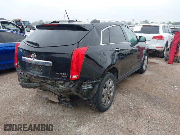 2016 Cadillac SRX Luxury Collection z VIN 3GYFNBE32GS577023, wystawiony jako IAAI lot #42374130 z przebiegiem 132 671 mil mil oraz . Historia ofert i sprzedaży dostępna na DreamBid. Obrazek 4.