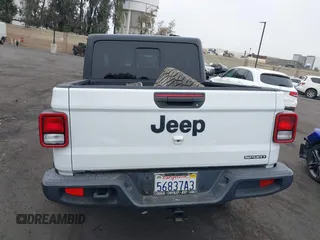2020 Jeep Gladiator Sport S with VIN 1C6HJTAG9LL194454, listed as a IAAI auction lot 42430339 with 90,461 mi miles and . Bid and sale history available at DreamBid. Image 17.