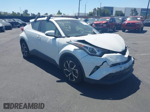 2019 Toyota C-HR XLE with VIN JTNKHMBX4K1040772, listed as a IAAI auction lot 41812031 with 79,729 mi miles. Bid and sale history available at carsss.com. Image 1.