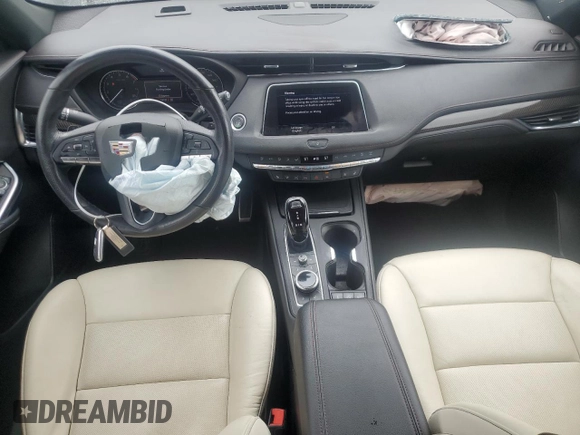 2022 Cadillac XT4 AWD Sport с VIN 1GYFZFR46NF170841, выставлен на аукционе Copart как лот 55863705 с пробегом 14 745 миль миль и Списание • Salvage title. История ставок и продаж доступна на DreamBid. Изображение 8.