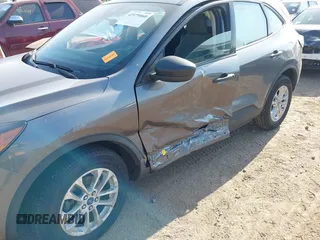 2021 Ford Escape S with VIN 1FMCU9F66MUA22600, listed as a IAAI auction lot 42579860 with 74,376 mi miles and . Bid and sale history available at DreamBid. Image 6.