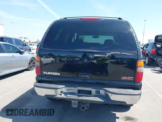2002 GMC Yukon SLT with VIN 1GKEC13T92R162978, listed as a IAAI auction lot 41851599 with 213,789 mi miles. Bid and sale history available at carsss.com. Image 16.