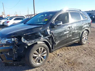 2013 Kia Sorento SX with VIN 5XYKW4A27DG393624, listed as a IAAI auction lot 41404019 with 203,597 mi miles. Bid and sale history available at carsss.com. Image 6.