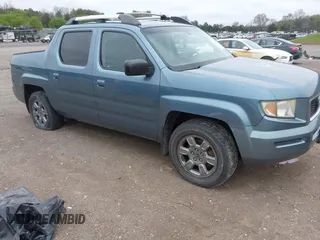 2007 Honda Ridgeline RTX with VIN 2HJYK16377H503711, listed as a IAAI auction lot 41886411 with 132,339 mi miles. Bid and sale history available at carsss.com. Image 1.