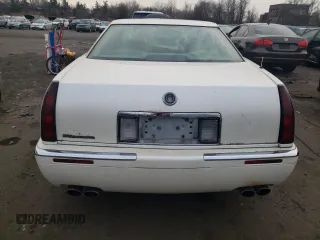 1999 Cadillac Eldorado z VIN 1G6EL12Y5XU600699, wystawiony jako Copart lot #88164505 z przebiegiem 140 075 mil mil oraz Szkoda całkowita • Salvage title. Historia ofert i sprzedaży dostępna na DreamBid. Obrazek 6.