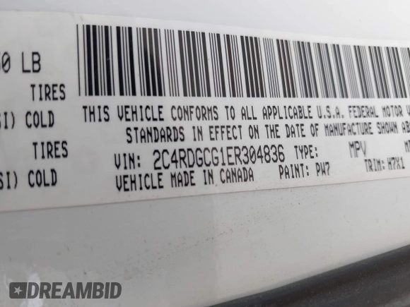 2014 Dodge Grand Caravan SXT with VIN 2C4RDGCG1ER304836, listed as a IAAI auction lot 42049558 with 186,831 mi miles and . Bid and sale history available at DreamBid. Image 9.