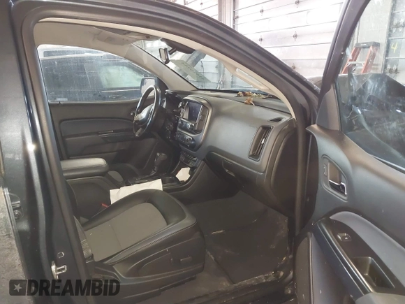 2019 Chevrolet Colorado 4WD Z71 z VIN 1GCGTDEN9K1299292, wystawiony jako IAAI lot #41626944 z przebiegiem 84 949 mil mil oraz . Historia ofert i sprzedaży dostępna na DreamBid. Obrazek 5.