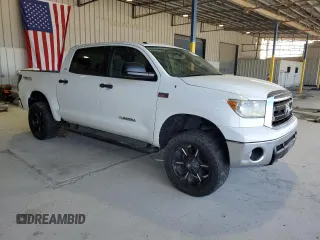 2013 Toyota Tundra 4WD Truck with VIN 5TFDW5F19DX289003, listed as a Copart auction lot 66719154 with 125,387 mi miles and Salvage Title. Bid and sale history available at carsss.com. Image 4.
