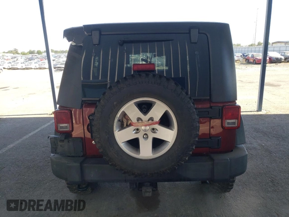 2010 Jeep Wrangler Unlimited Rubicon with VIN 1J4BA6H18AL197855, listed as a Copart auction lot 57748185 with 147,899 mi miles and Salvage title. Bid and sale history available at DreamBid. Image 6.