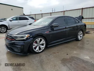 2020 Volkswagen Jetta GLI S z VIN 3VW5T7BU8LM087408, wystawiony jako Copart lot #70297994 z przebiegiem 36 203 mil mil oraz Czysty tytuł • Clean title. Historia ofert i sprzedaży dostępna na DreamBid. Obrazek 1.