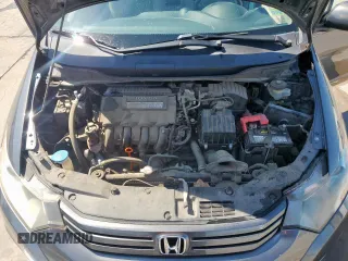 2010 Honda Insight LX with VIN JHMZE2H56AS042097, listed as a Copart auction lot 53972215 with 107,182 mi miles and Salvage Title. Bid and sale history available at DreamBid. Image 11.