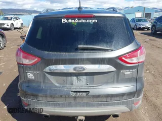 2016 Ford Escape Titanium with VIN 1FMCU9J96GUB96009, listed as a IAAI auction lot 41866127 with 132,990 mi miles and . Bid and sale history available at DreamBid. Image 17.