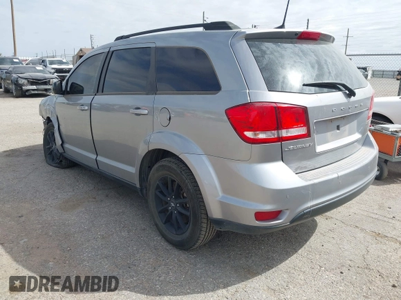 2019 Dodge Journey SE z VIN 3C4PDCBB5KT861358, wystawiony jako IAAI lot #41947841 z przebiegiem 82 099 mil mil oraz . Historia ofert i sprzedaży dostępna na DreamBid. Obrazek 3.