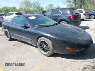1996 Pontiac Firebird Firebird z VIN 2G2FS22K0T2231261, wystawiony jako IAAI lot #42088061 z przebiegiem 194 913 mil mil oraz . Historia ofert i sprzedaży dostępna na DreamBid. Obrazek 1.
